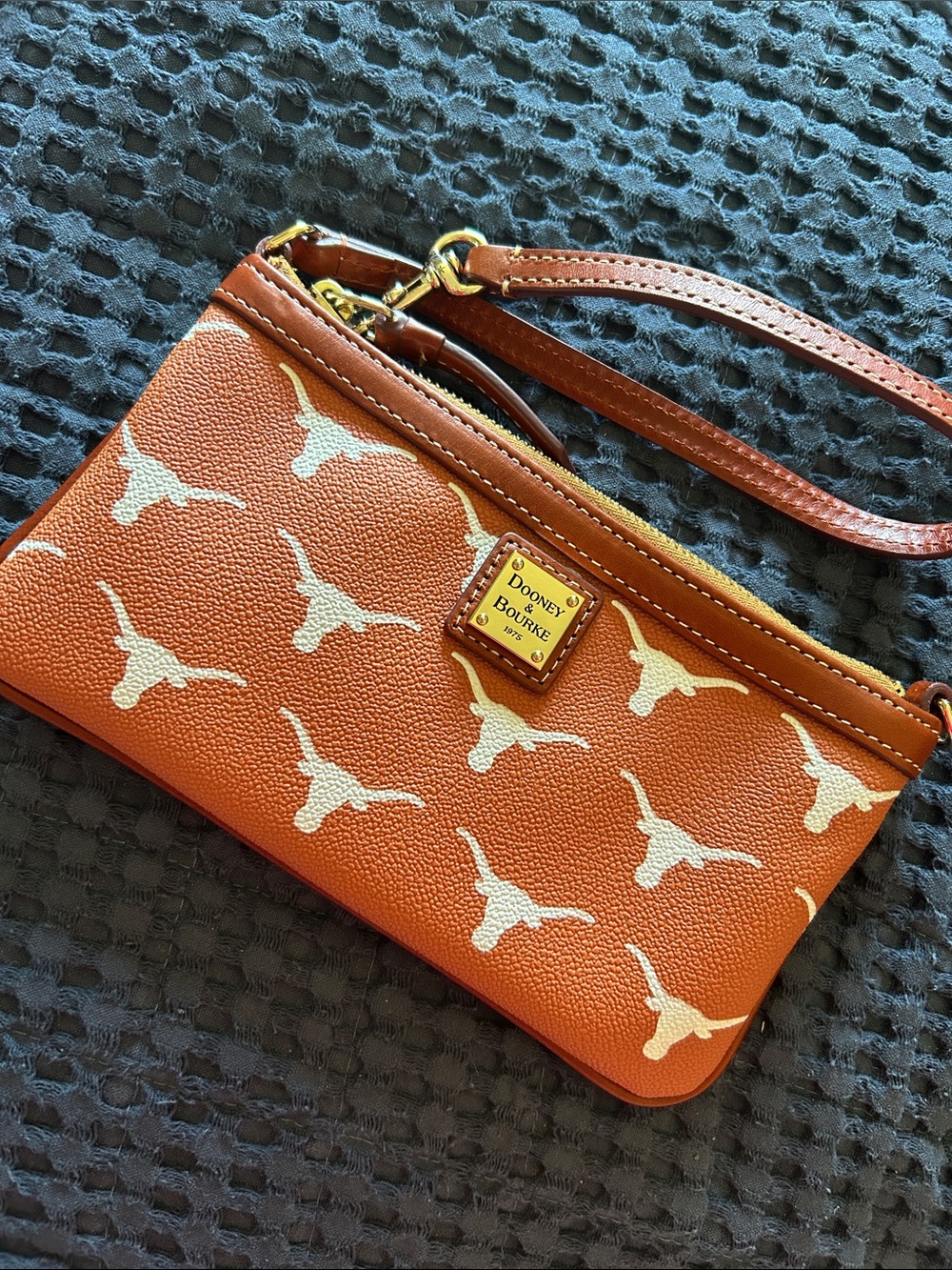 Dooney & Bourke Orange and White Longhorn Print Wristlet